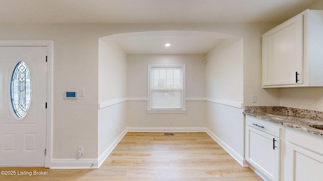 interior space with light hardwood / wood-style flooring