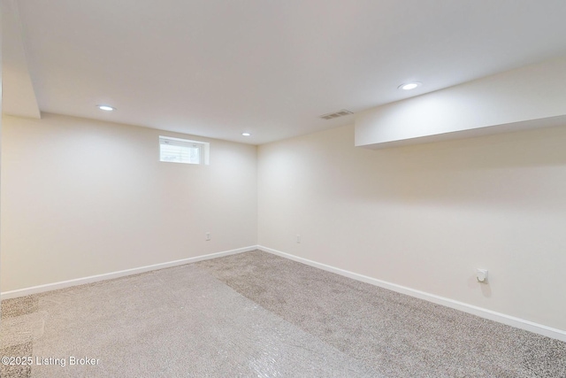 basement featuring carpet flooring