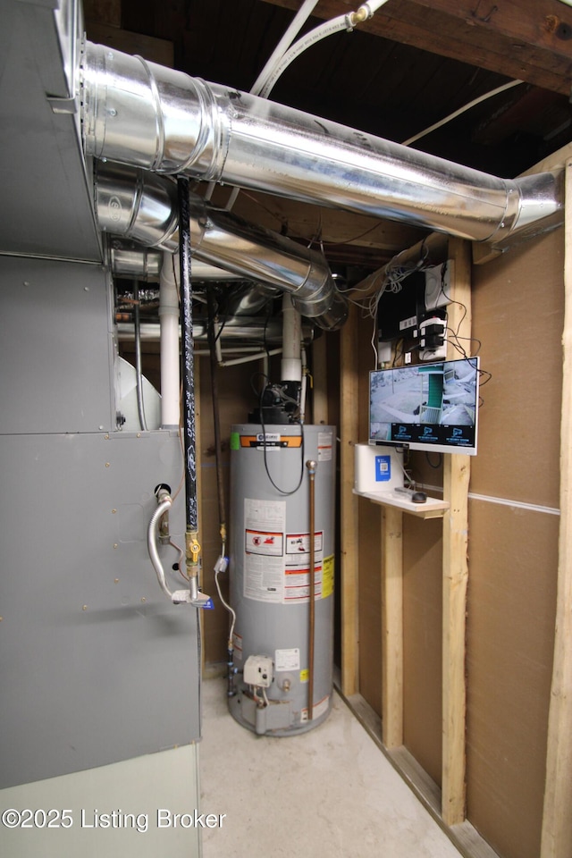 utility room featuring gas water heater