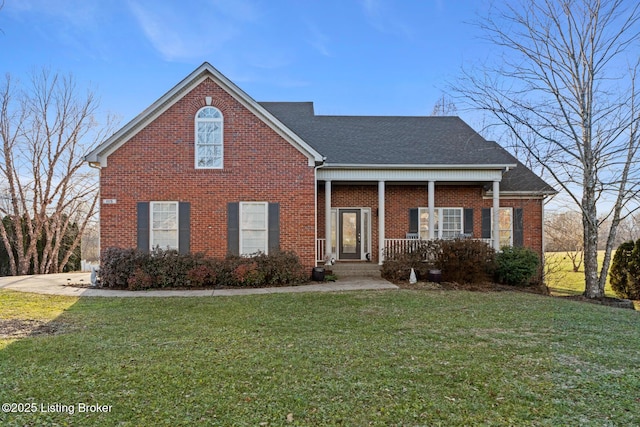 front facade with a porch and a front lawn