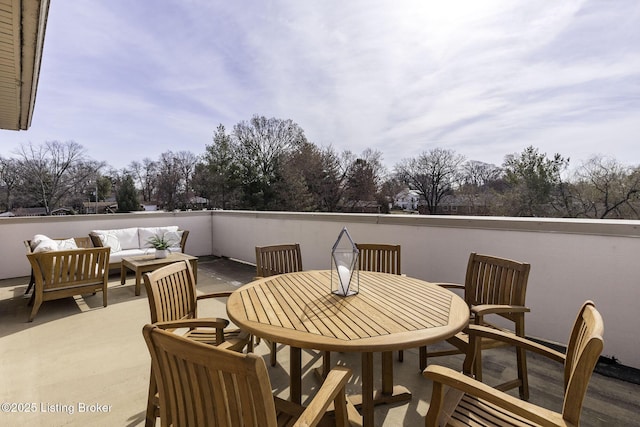 view of patio / terrace featuring outdoor dining space and an outdoor living space