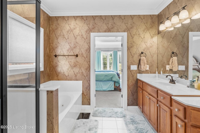 ensuite bathroom featuring crown molding, double vanity, a sink, and connected bathroom