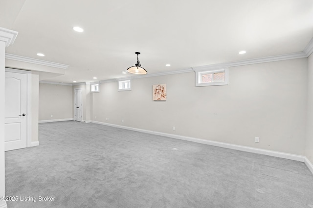 basement with baseboards, carpet floors, ornamental molding, and recessed lighting