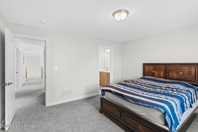 bedroom featuring light colored carpet, visible vents, and baseboards