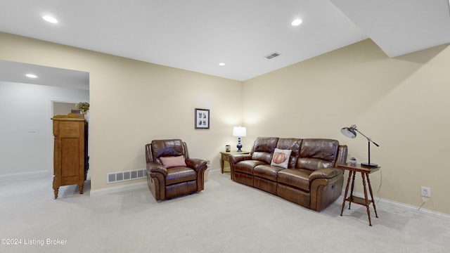 living room featuring light colored carpet