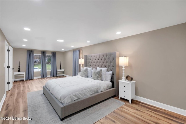 bedroom featuring light hardwood / wood-style floors