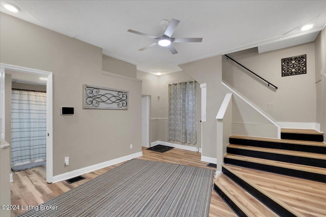 interior space featuring light hardwood / wood-style flooring and ceiling fan