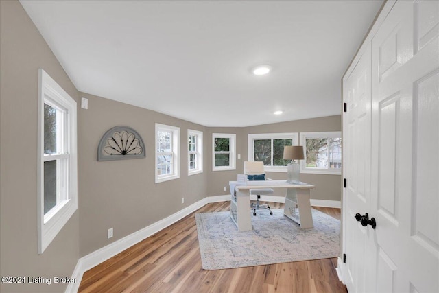 office area with wood-type flooring