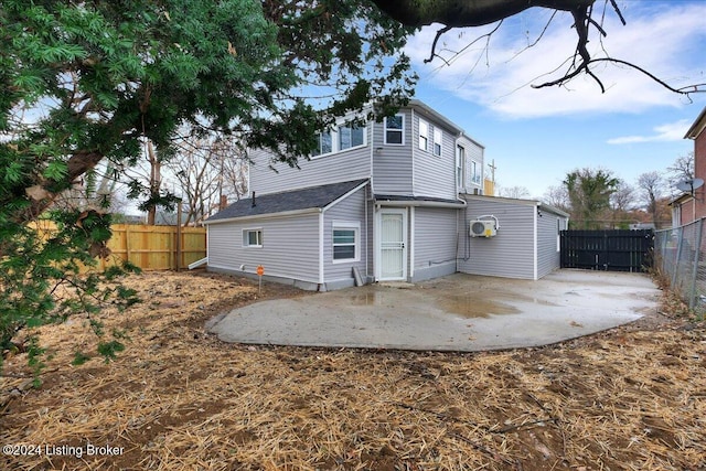 back of house featuring a patio area