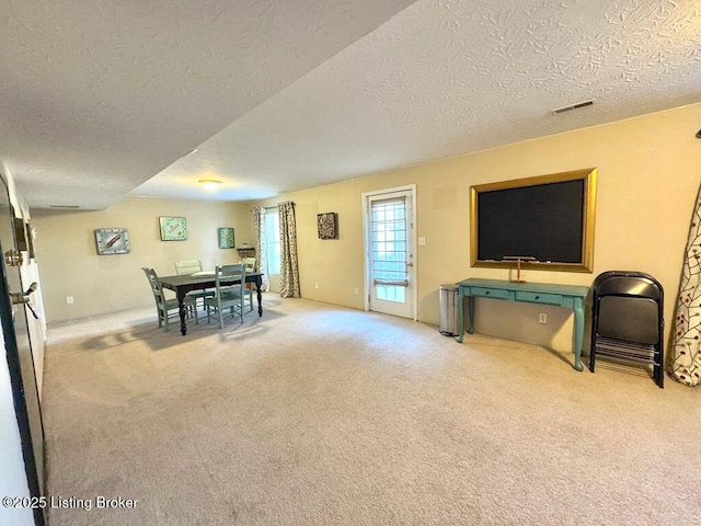 interior space featuring a textured ceiling