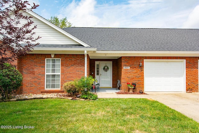 single story home with a garage and a front lawn