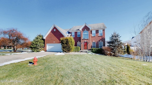 view of front of home featuring a garage and a front yard