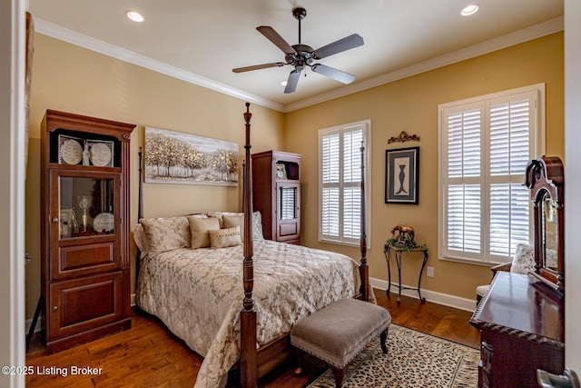 bedroom featuring multiple windows, dark hardwood / wood-style flooring, ornamental molding, and ceiling fan