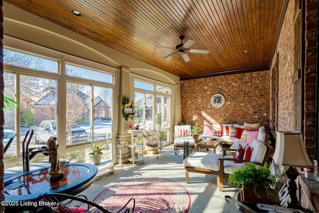 sunroom featuring wooden ceiling and ceiling fan