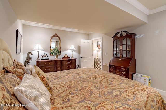 bedroom with crown molding