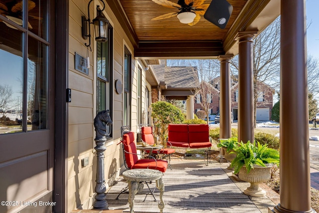 view of patio / terrace with ceiling fan and a porch