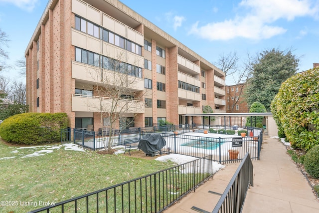 exterior space with a patio, a yard, and grilling area