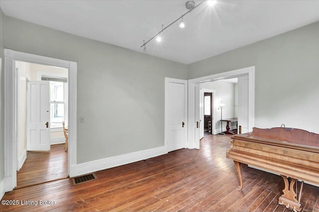 misc room with hardwood / wood-style flooring