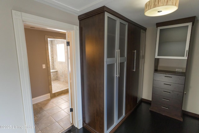 corridor with tile patterned floors