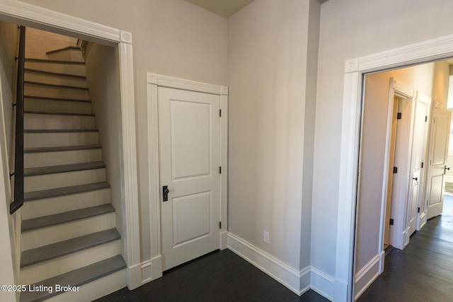 staircase featuring hardwood / wood-style floors