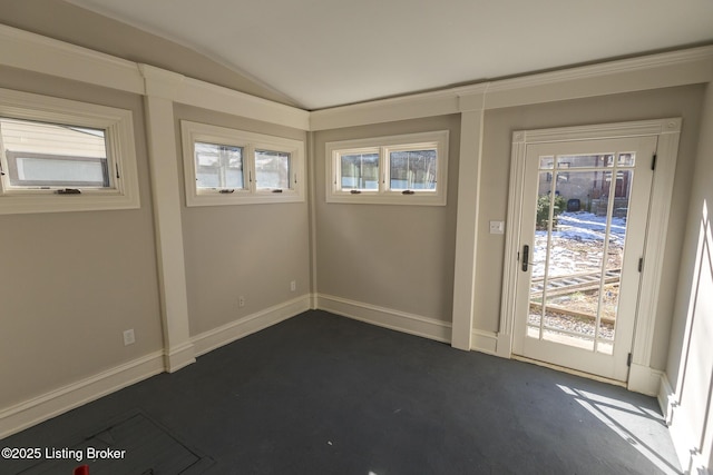 doorway featuring lofted ceiling and a wealth of natural light