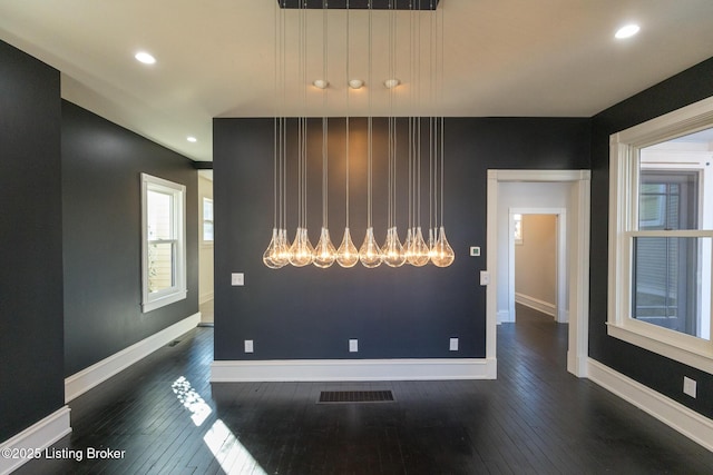 spare room featuring dark hardwood / wood-style floors