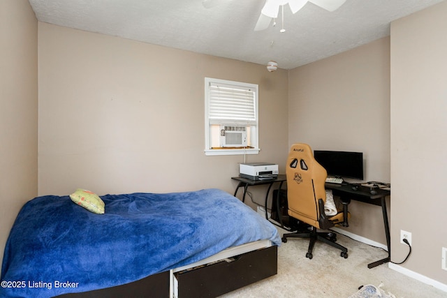 carpeted bedroom featuring ceiling fan, cooling unit, and a textured ceiling