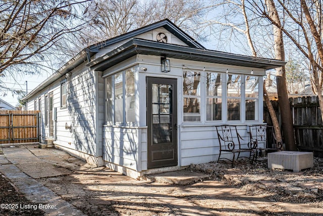 view of outdoor structure with central AC