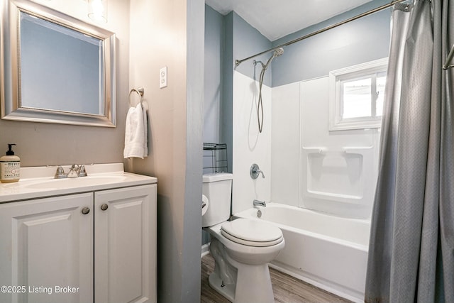 full bathroom with vanity, toilet, wood-type flooring, and shower / bath combo