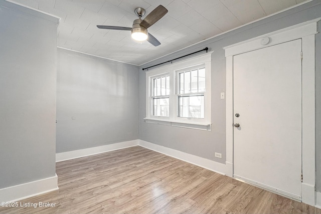 unfurnished room featuring ceiling fan and light hardwood / wood-style floors