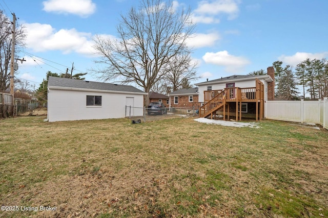 view of yard featuring a wooden deck