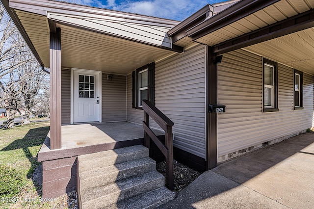 property entrance with a porch