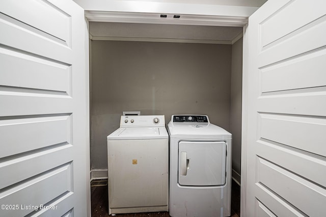 laundry room featuring separate washer and dryer