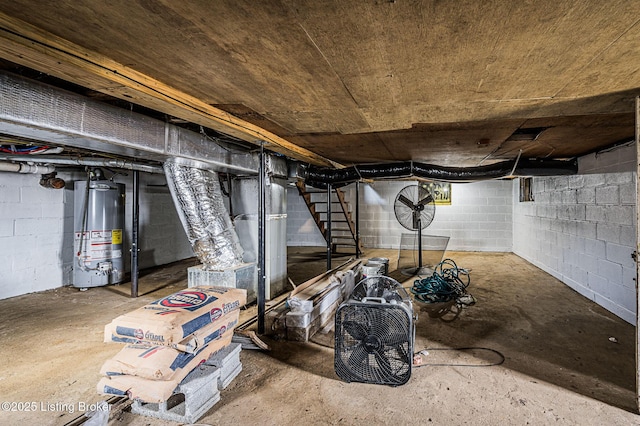 basement featuring heating unit and gas water heater