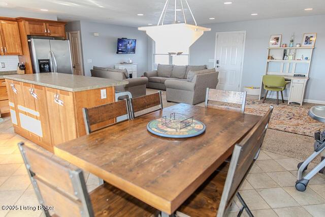 dining room featuring light tile patterned floors