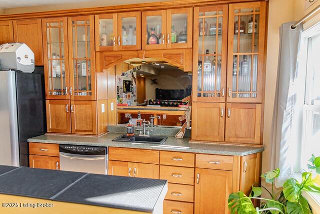 kitchen featuring stainless steel appliances and sink