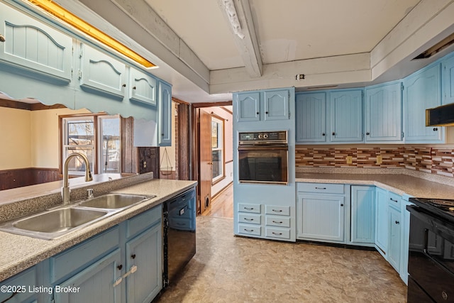 kitchen featuring beamed ceiling, blue cabinets, sink, and black appliances