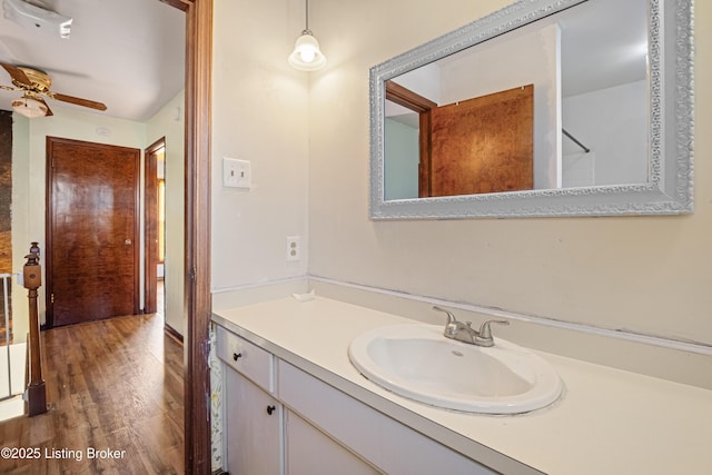 bathroom with vanity and hardwood / wood-style floors