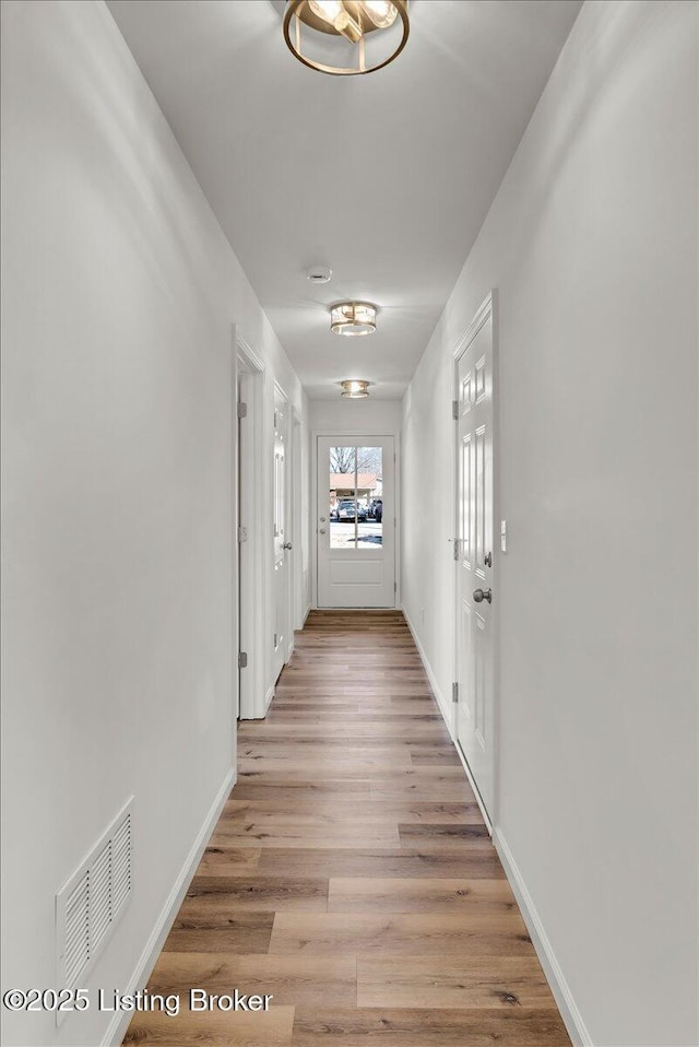 hallway featuring light hardwood / wood-style floors