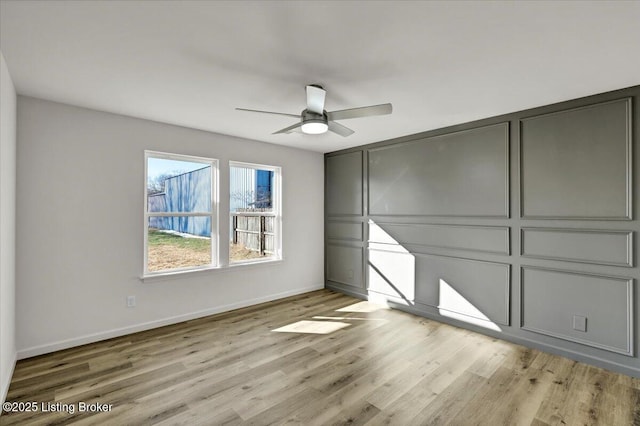 unfurnished bedroom with light hardwood / wood-style floors and ceiling fan