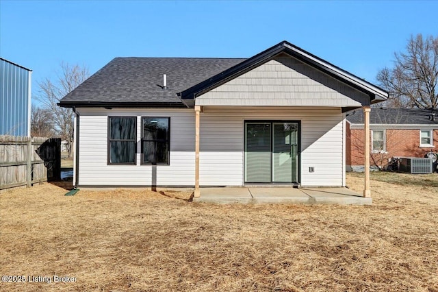 back of property featuring a patio, a yard, and cooling unit