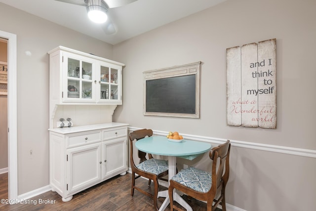 dining area featuring dark hardwood / wood-style floors