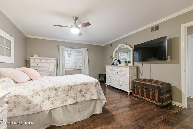 bedroom featuring ornamental molding, dark wood-type flooring, and ceiling fan