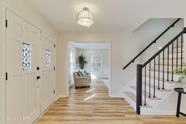 entrance foyer with light hardwood / wood-style floors