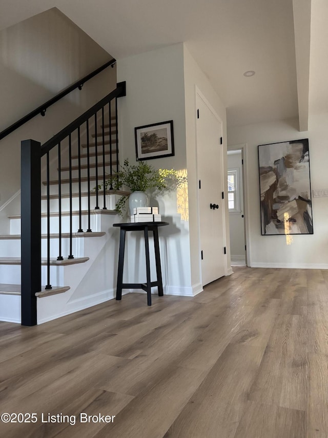 interior space with hardwood / wood-style flooring