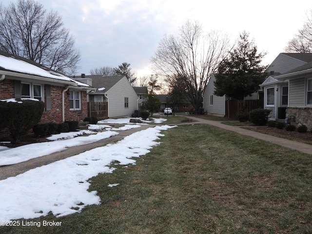 view of yard covered in snow