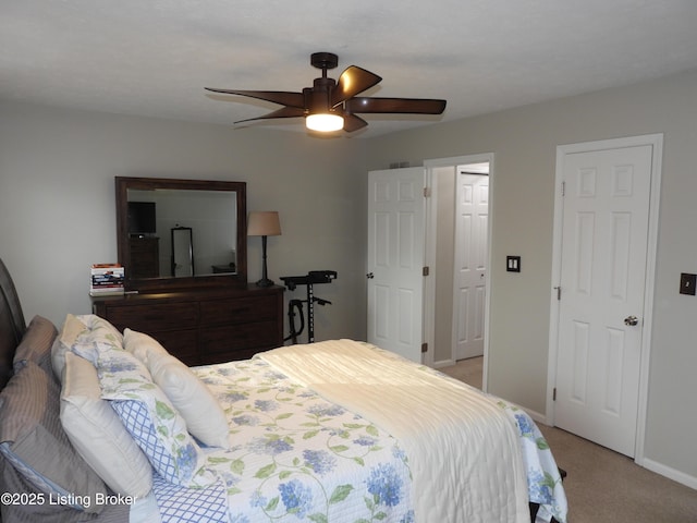 bedroom with light carpet and ceiling fan