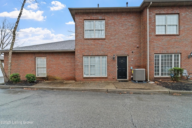 view of front of property with central AC unit