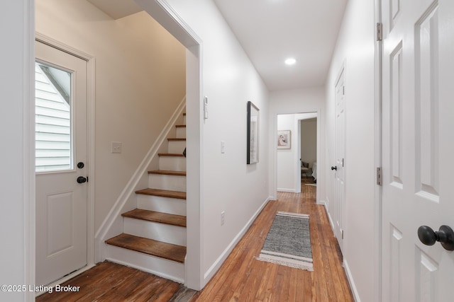 hall featuring wood-type flooring