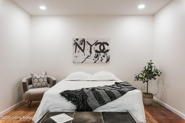 bedroom featuring dark wood-type flooring